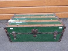 A vintage ash and metal bound trunk with leather handles
