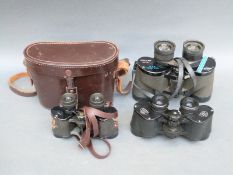 Four pairs of binoculars to include Ross Stepnada 7x30 and Steprura 9x35