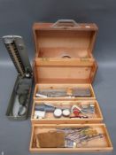 A cased GP or similar travelling medical kit including ear syringing kit, forceps etc.