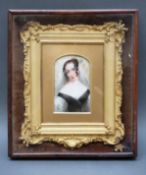 A 19thC portrait miniature on ivory of a young lady with veil in ornate surround and outer case