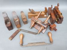 A quantity of vintage woodworking planes including rebate plane,