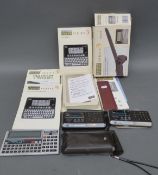 A collection of vintage calculators including Casio FX-730P,