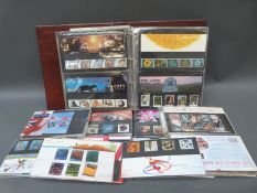 A GB presentation pack album and a quantity of loose packs