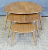 A retro Ercol light elm nest of pebble tables (H41 x L66 x W47cm)