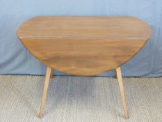 A retro Ercol light elm drop leaf table (H72 x W112 x D123cm)