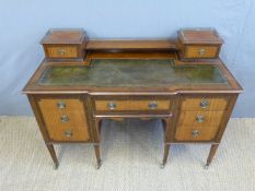 A late 19th/early 20thC leather inset desk with two drawers to top and galleried back,