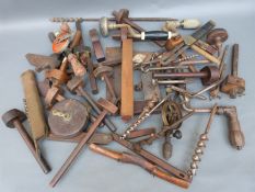 A quantity of vintage woodworking tools including squares, mortice gauges,