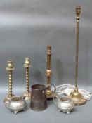 Three brass candlesticks, a tall brass electric table light,