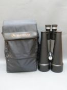 A pair of Celestron SkyMaster 25x100 high powered waterproof binoculars in original carry bag