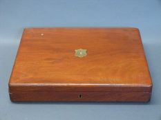 A mahogany pistol box with felt-lined fitted interior to accommodate three percussion pistols and a