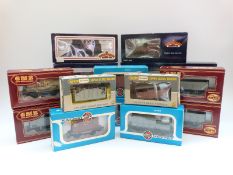 Sixteen Bachmann, Airfix and Wrenn 00 gauge carriages and wagons,