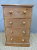 A pine chest of four drawers,