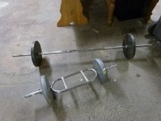 Two weightlifting bars plus weights
