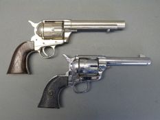 Two Colt replica blank firing Single Action Army .
