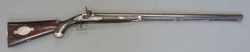 The Alexandra Rifle 32 bore percussion hammer action gun with engraved lock, silver mounts,