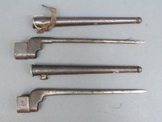 Two No 4 MkII spike bayonets in scabbards