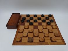 A mahogany and olive wood folding campaign chess board,