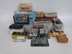 A collection of various diecast model vehicles together with a small quantity of Meccano and three