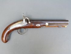 A 20 bore percussion hammer action pistol with engraved lock, trigger guard,