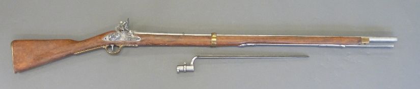 A replica flintlock hammer action rifle with lock stamped Tower and with crown over GR cipher and