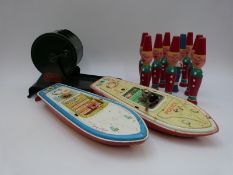 A quantity of vintage toys including two clockwork boats,