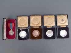 Cased Elizabeth II Imperial Service Medal awarded to Arthur Denby together with four (one bronze