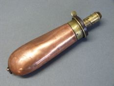James Dixon and Sons copper and brass pistol powder flask stamped 'Fireproof' and with single