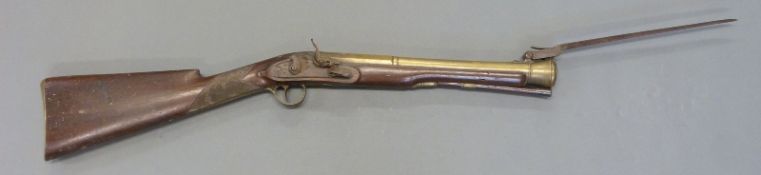 John Dust of London flintlock hammer action blunderbuss with named and engraved lock,