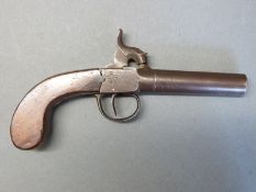 Percussion hammer action pistol with engraved lock, top plate and trigger guard,