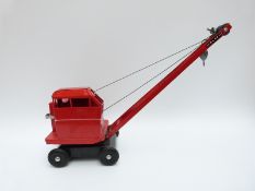 Tri-ang pressed steel model crane with red body and black chassis