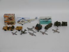 Sixteen Dinky Toys, Britains and Matchbox Lesney diecast model military vehicles including,