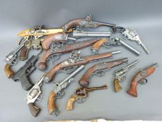 Seventeen replica revolvers and pistols including flintlock, percussion,
