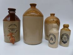 A collection of named stone jars / flagons for William Legge, Berkeley; Perry Bros,