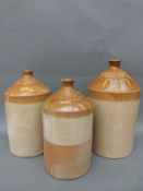 Three large stoneware flagons including Hick and Sons, Leeds; Brown Carson, Leeds and White and Son,