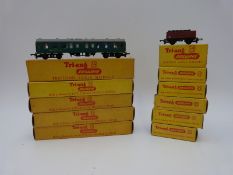 Eleven Tri-ang TT gauge carriages and wagons,