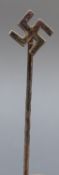 A white metal Nazi German swastika tie pin stamped 835S
