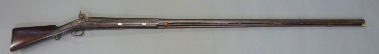 Couzens 8 bore percussion hammer action bank gun with engraved scenes of birds amongst plants to