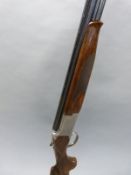 Browning 525 12 bore over and under shotgun with scenes of wildfowl to the locks,