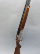 Rizzini Artemis 20 bore over and under shotgun with engraved scenes of ducks and pheasants to the