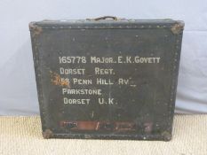A military interest travelling trunk painted 165788 Major E K Govett Dorset Regiment to both sides