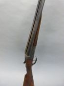 AYA 12 bore side by side ejector shotgun with ornate engraving, named lock and 28inch barrels,