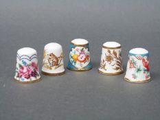 Four Royal Worcester thimbles and one other