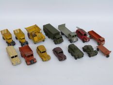 Fourteen Dinky Toys and Dinky Supertoys diecast model vehicles including military, lorries, vans,