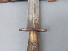 Fairbairn Sykes 2nd pattern fighting knife with knurled grip in leather sheath