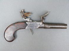 An indistinctly named English flintlock hammer action pistol with lock engraved London,