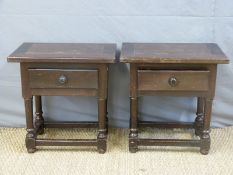 A pair of oak bedside cabinets,