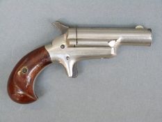 Colt No 3 .41 rimfire pocket pistol with shaped walnut grips and 2.