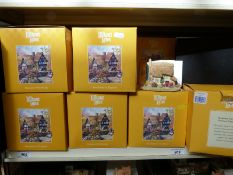 Eighteen yellow boxed Lilliput Lane cottages to include Porlock Down,