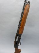 Beretta A 303 12 bore semi-automatic shotgun with engraved locks, chequered semi-pistol grip,