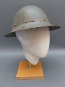 A WWII helmet dated to leather 1941 and to rim 2,